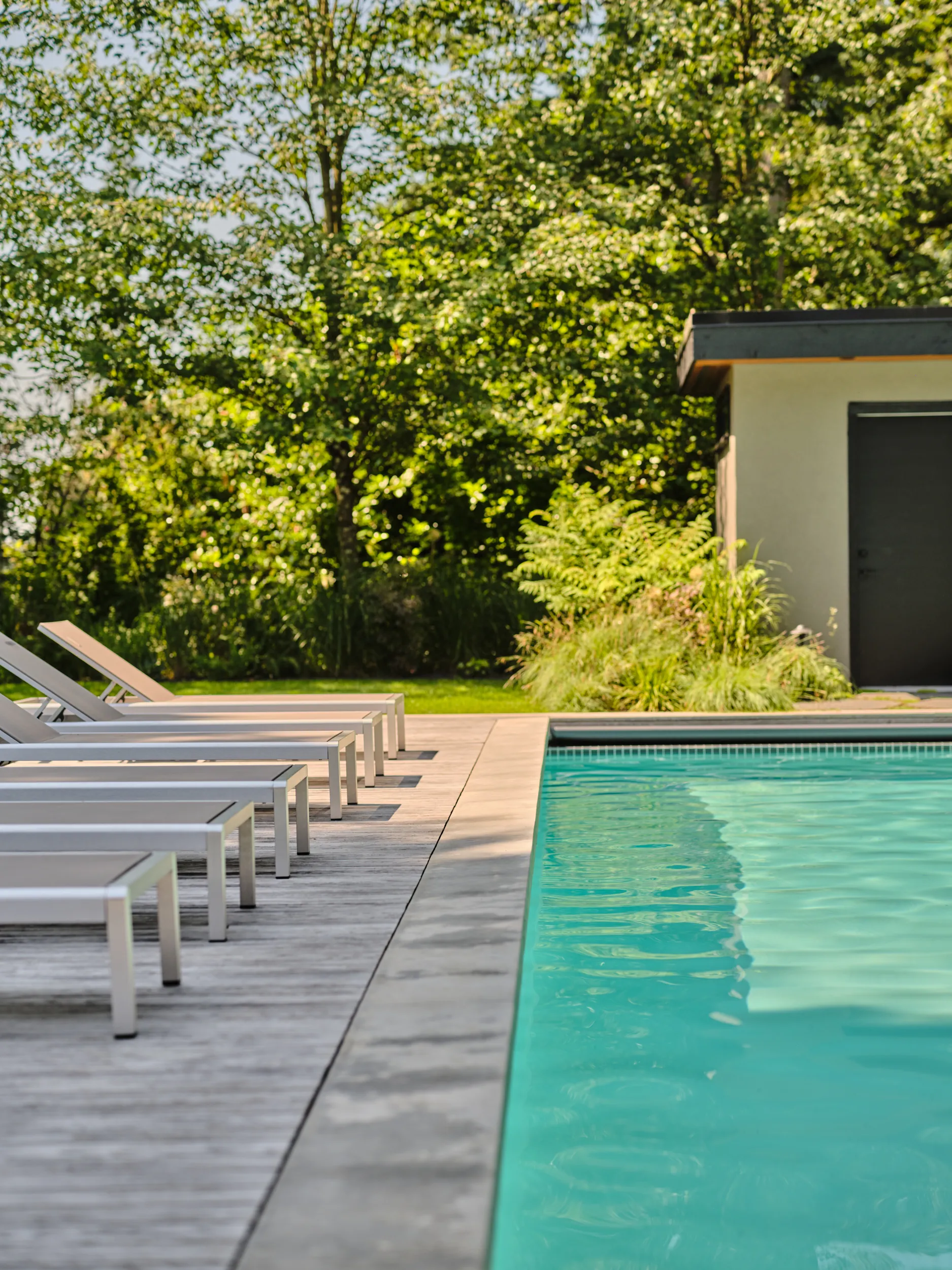 Pool deck and concrete pool house, Capilano, North Vancouver