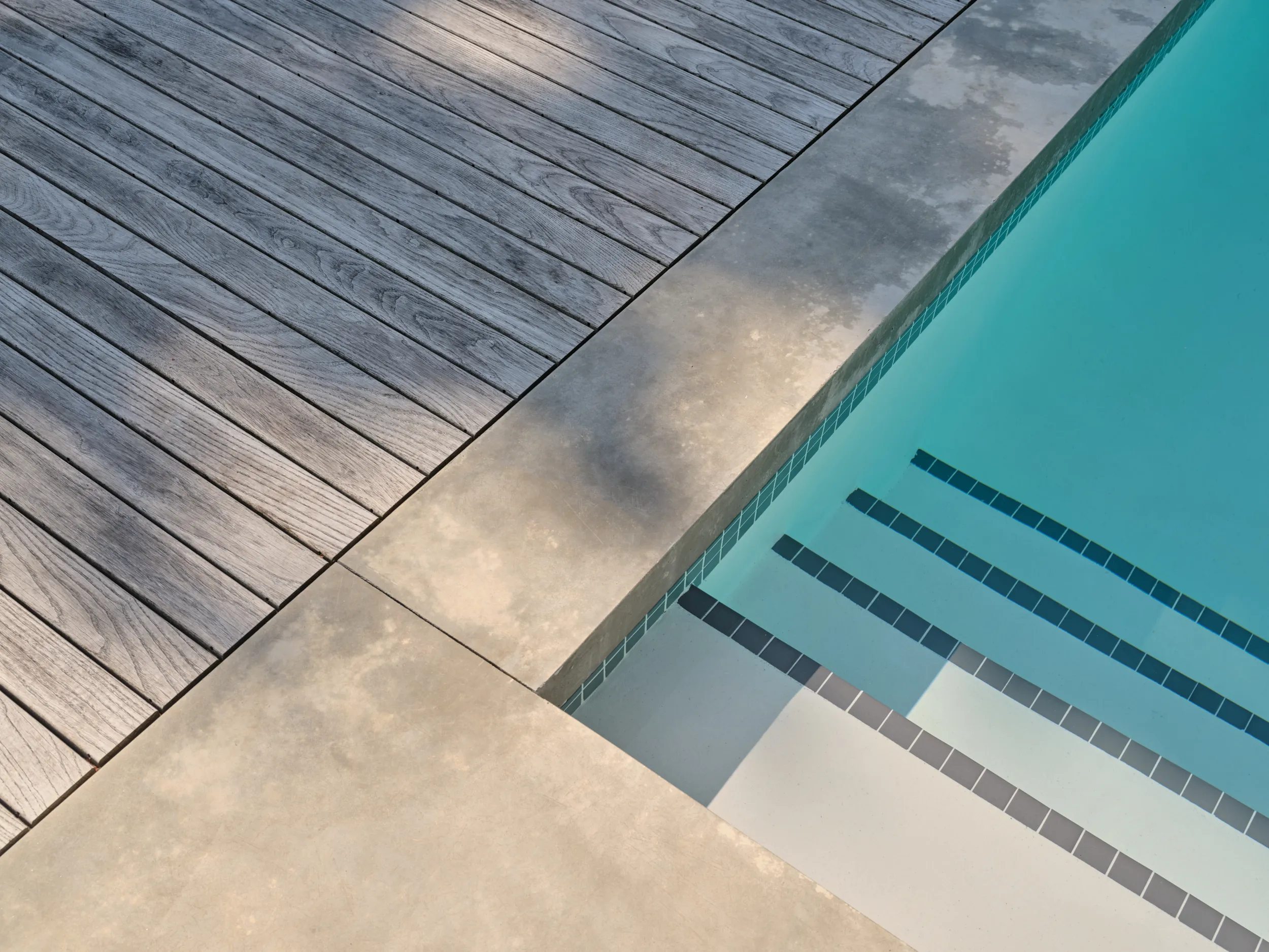 Pool house and mechanical room integrated as one concrete unit, North Vancouver