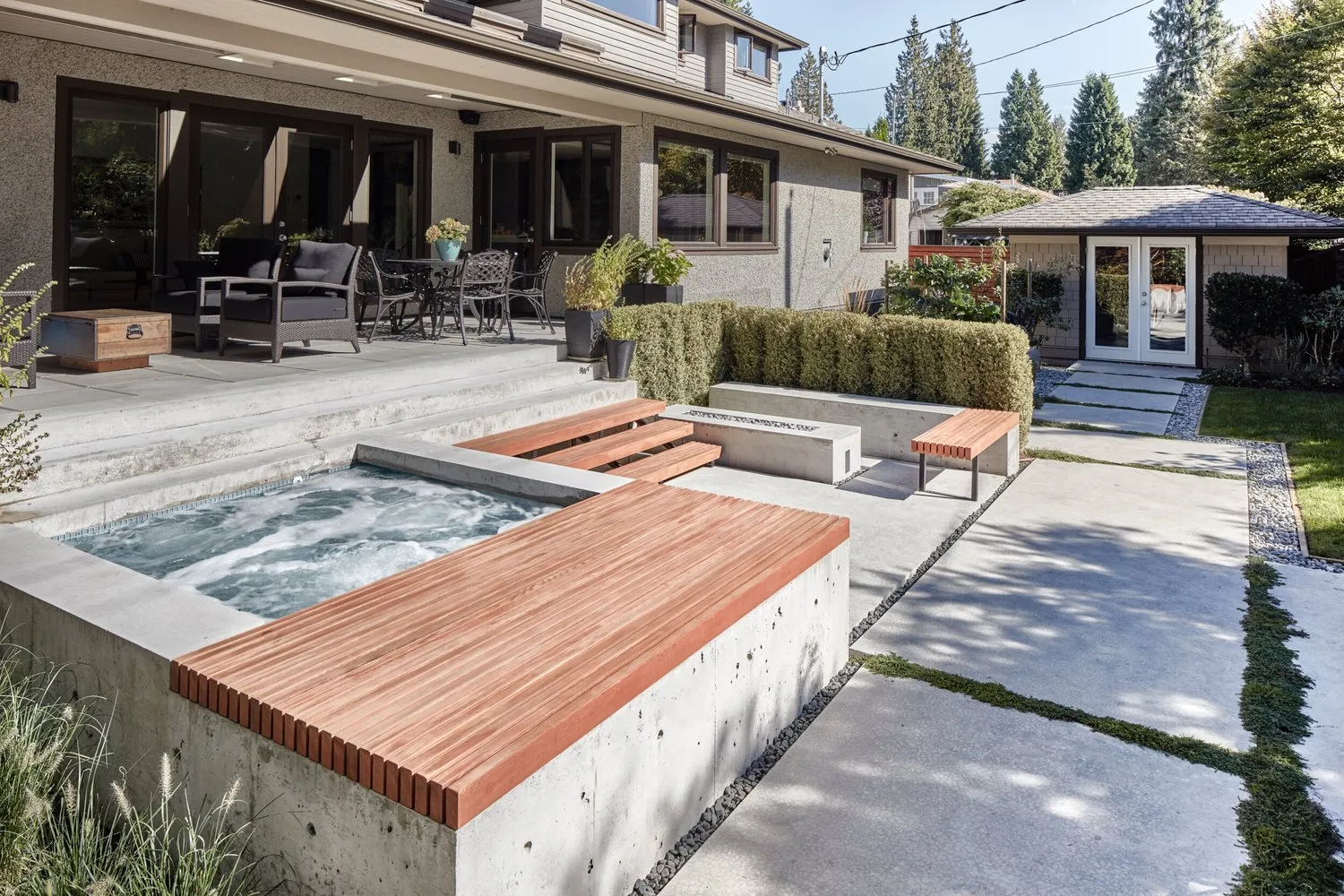 Concrete architecture surrounding a sunken pool, Edgemont, North Vancouver — Dankor Construction
