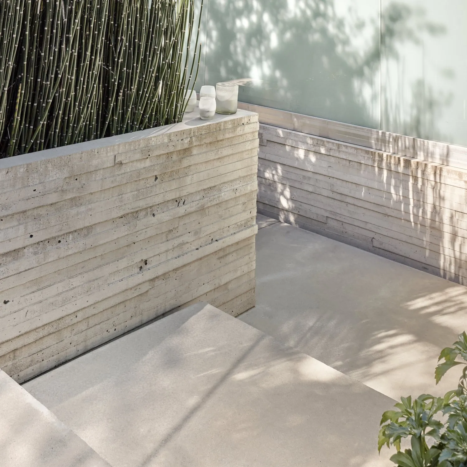 Outdoor living area balancing concrete and greenery, Kitsilano, Vancouver