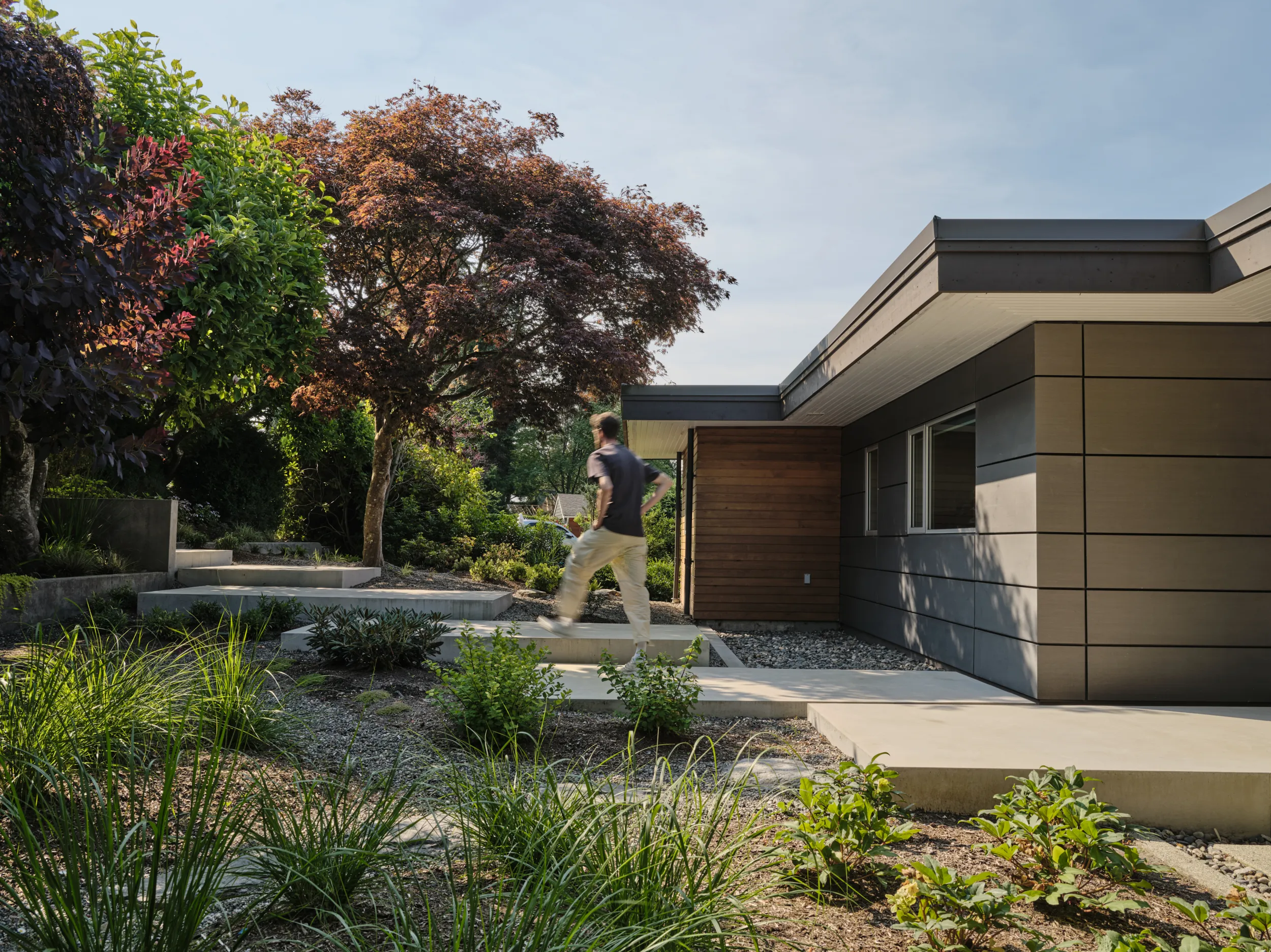 Clean-line concrete pathway to the home's entrance, Lonsdale, North Vancouver